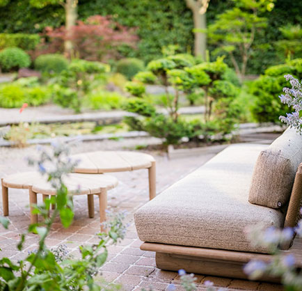 wooden sofa and three wooden small tables